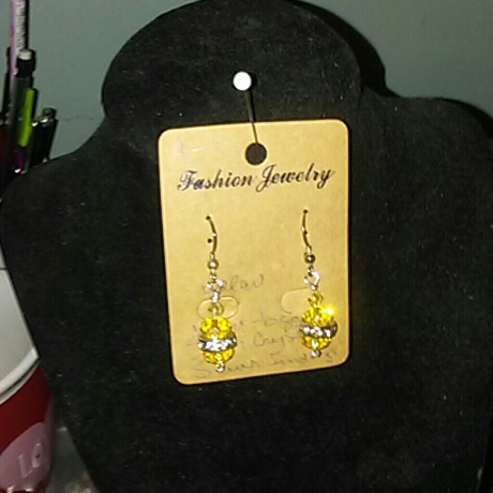 Yellow crystal earrings with faux diamond accents